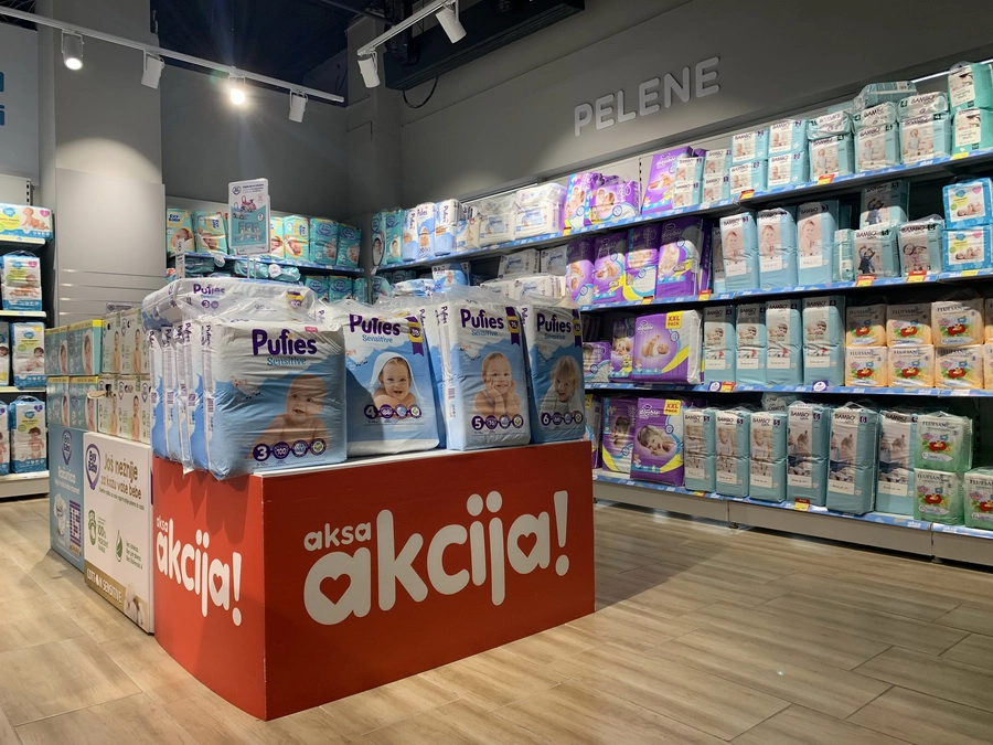 Aksa baby products aisle with promotional sale display