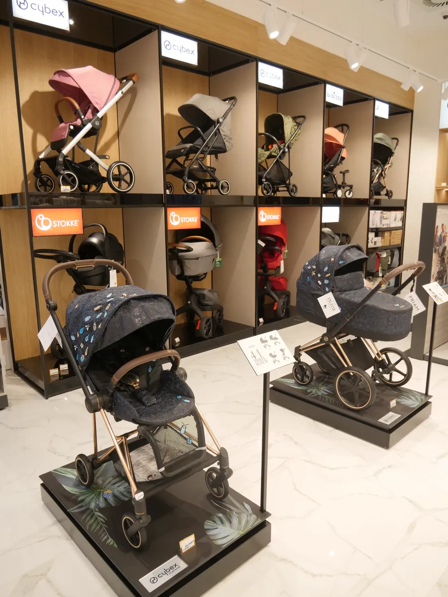 Baby Shop Premium stroller display area in a branded retail store