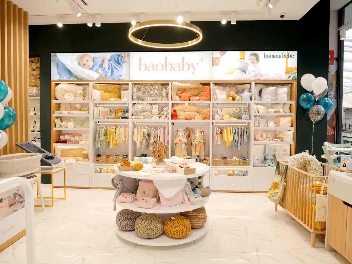 Baby Shop Premium retail interior with branded wall shelving and product display
