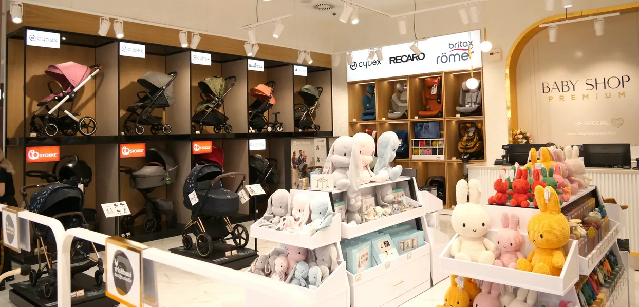 Baby Shop Premium retail interior with branded wall shelving and product display