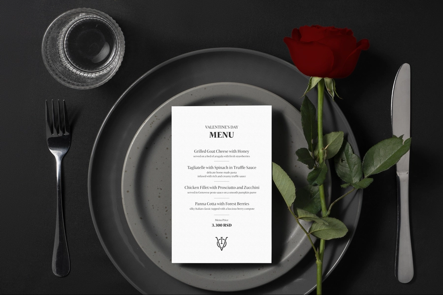 Valentine’s menu design for IVO restaurant with black table setting and red rose